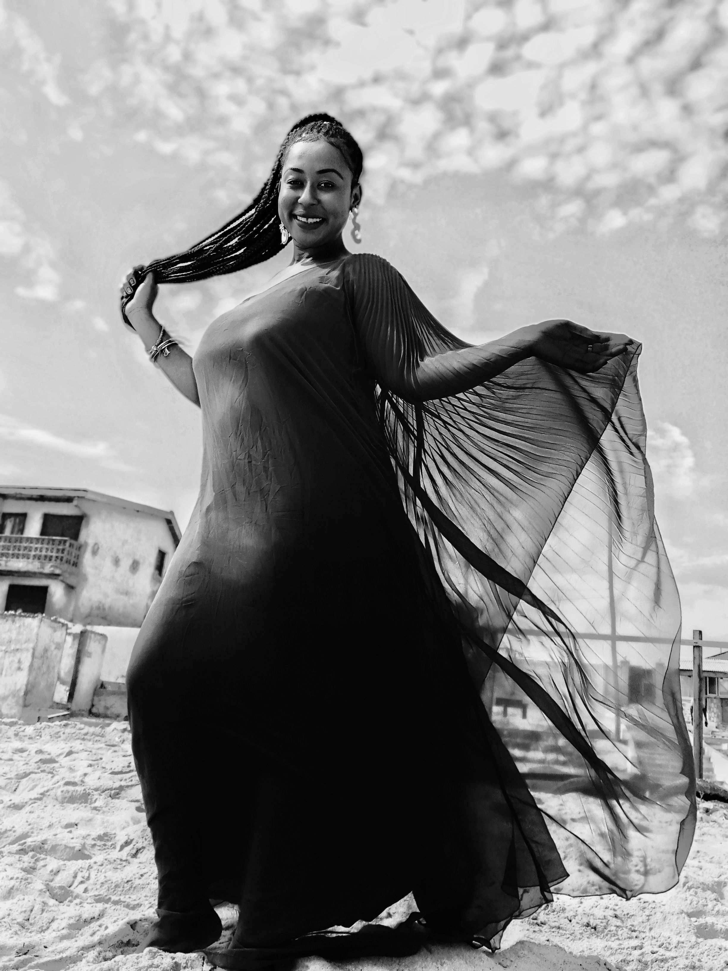 Black and White Portrait of a Woman Wearing a Dress · Free Stock Photo