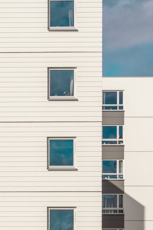 White Building With Blue Glass Windows