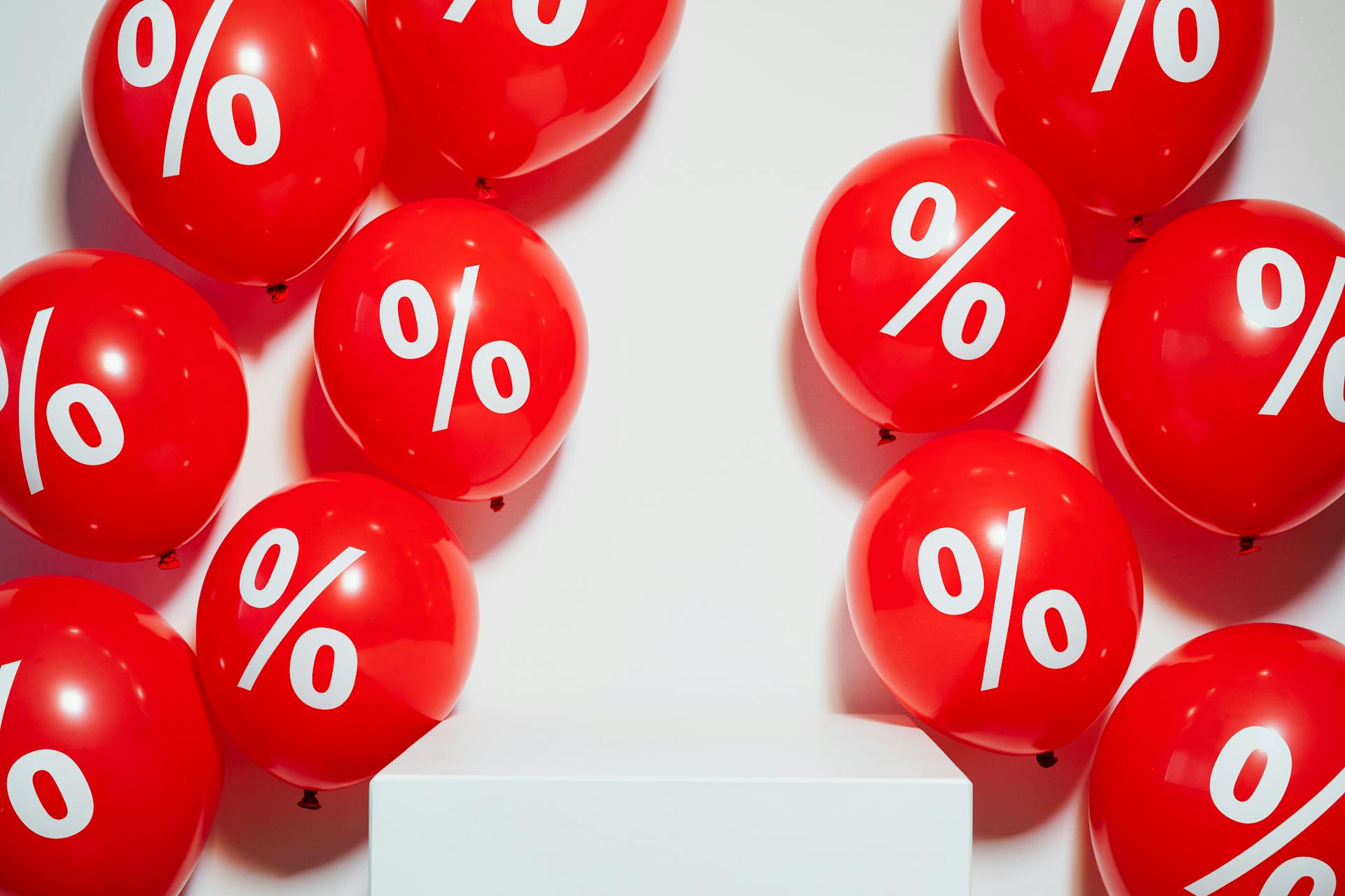 Red Balloons with Percent Sign