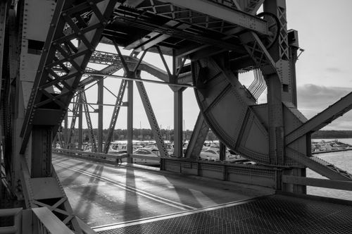 Free Black and white photo of a detailed steel bridge structure, showing intricate design. Stock Photo