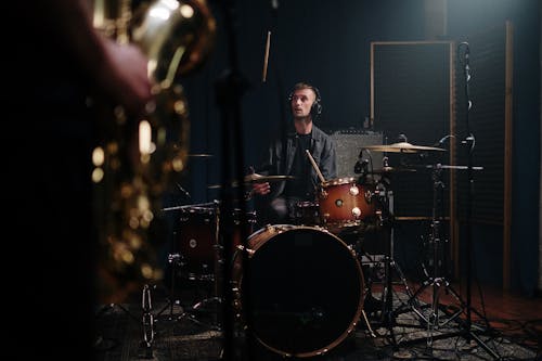 Free Person Playing Drums in Recording Studio Stock Photo