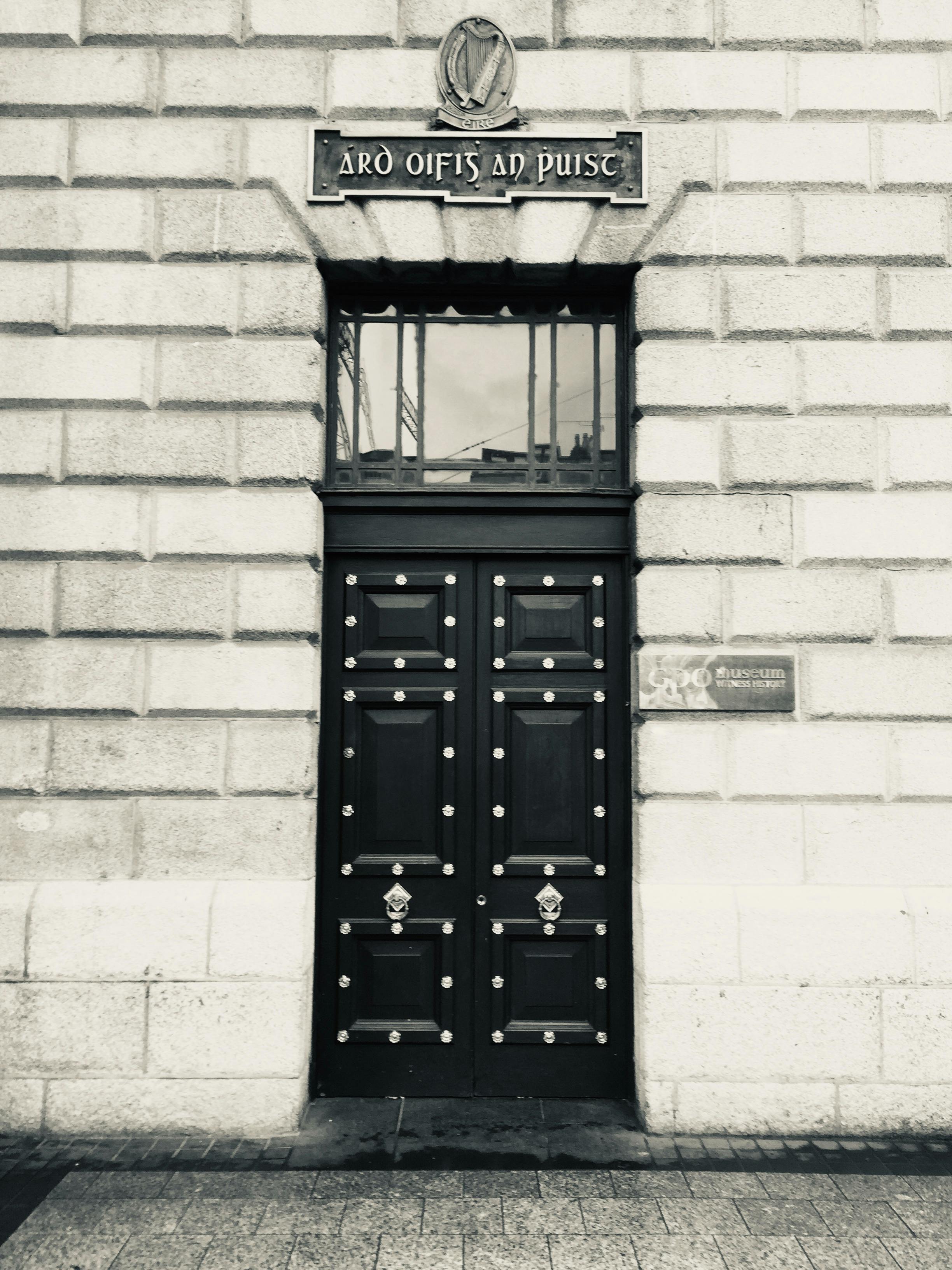 Photo of Two Women Decorating a Baby Room with Wall Decals