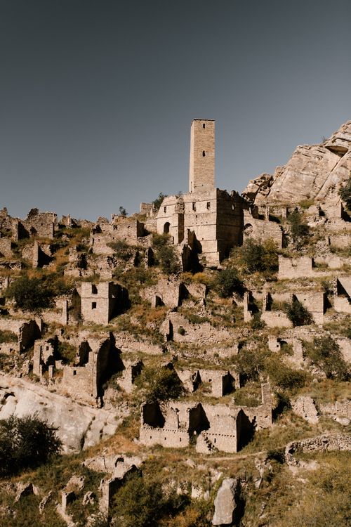 Free Explore the haunting beauty of Craco, a ghost town in Italy, captured from above. Stock Photo