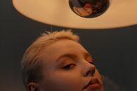 Boy in Red Shirt Looking at the Mirror