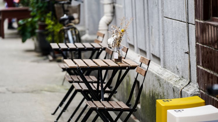 Cafe Wooden Tables Outside On Street