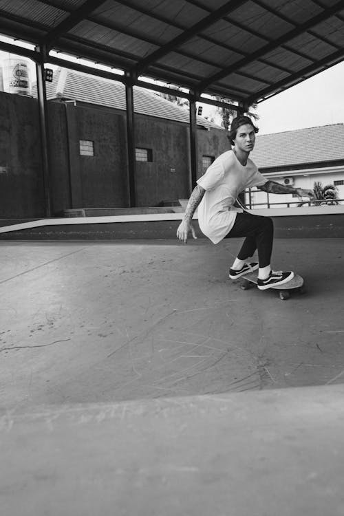 Young Man Riding on a Skateboard 