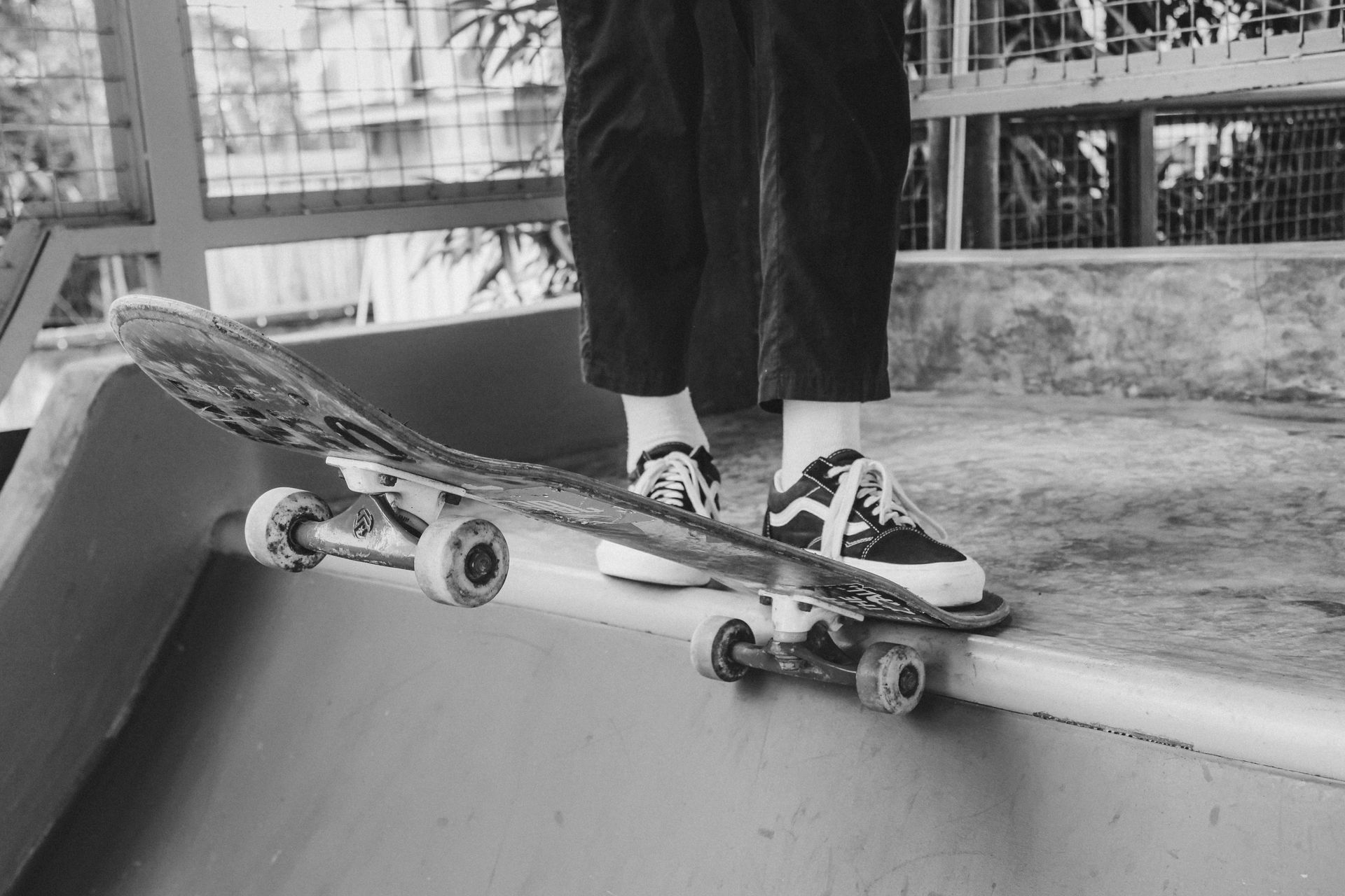 Legs and Skateboard on Ramp