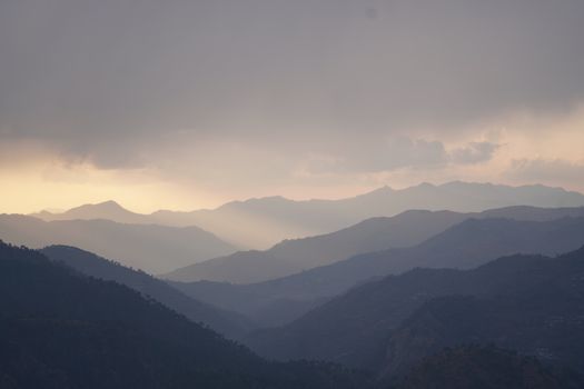 Foggy Mountains Under White Clouds