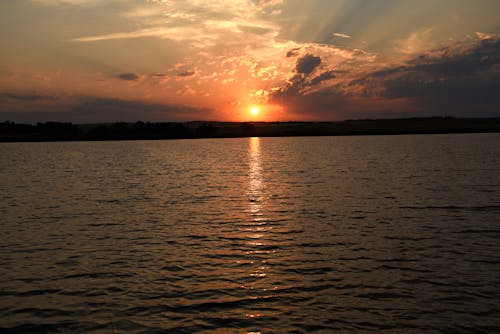 Body of Water During Sunset