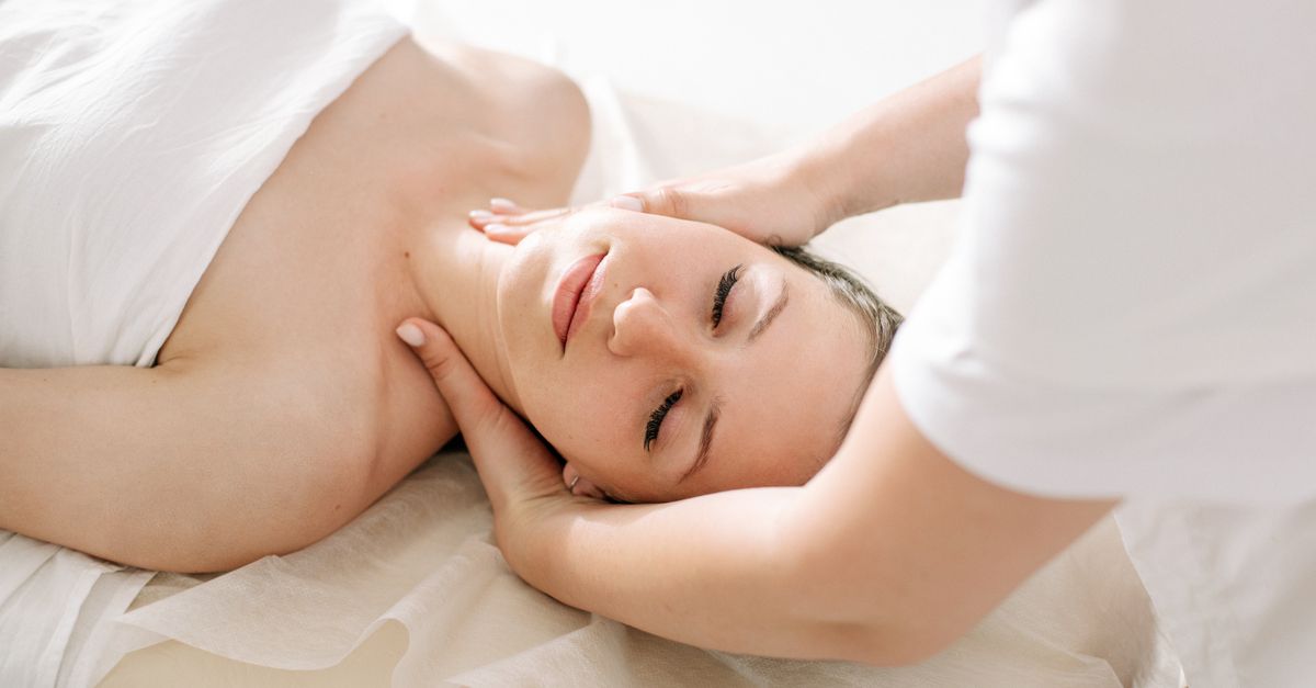 Massage therapist working on a client's back.