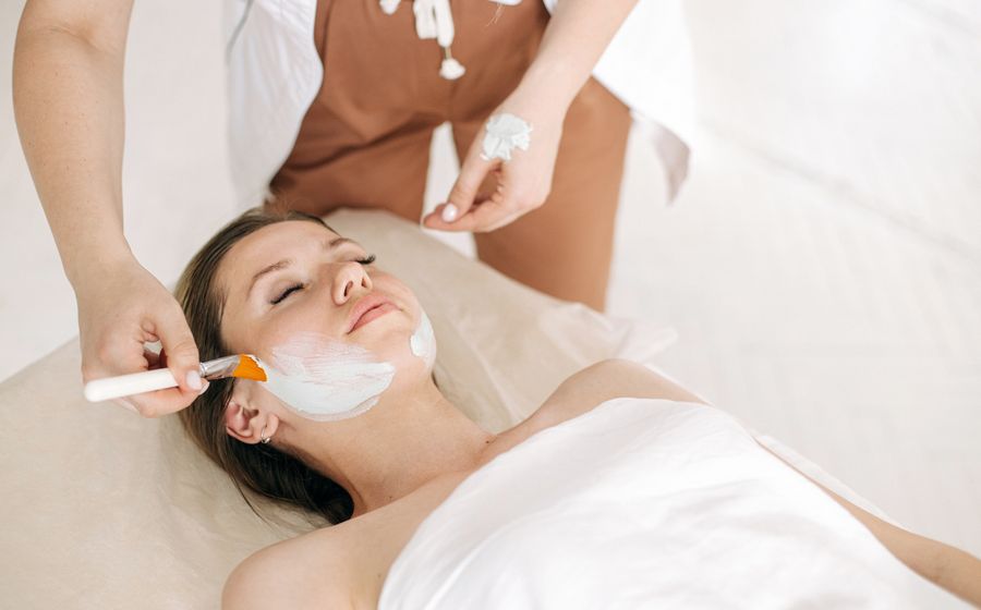 Skin treatment in Mumbra being administered during a calming skin wellness session at the clinic