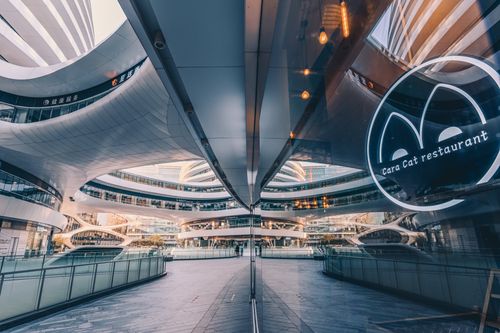 Free Reflection of the futuristic architecture at Galaxy Soho, a modern landmark in Beijing, China. Stock Photo