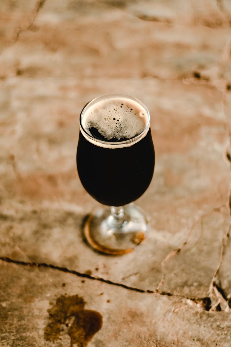 A Belgian Glass Filled With Beer 