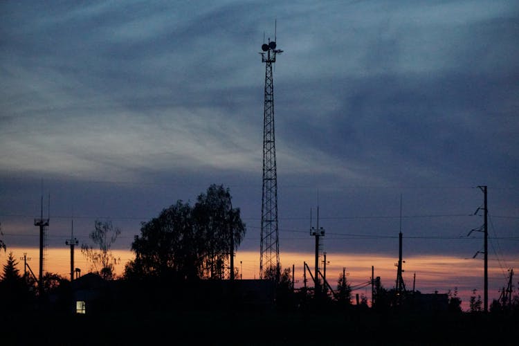 A Radio Mast Under A Cloudy Sky