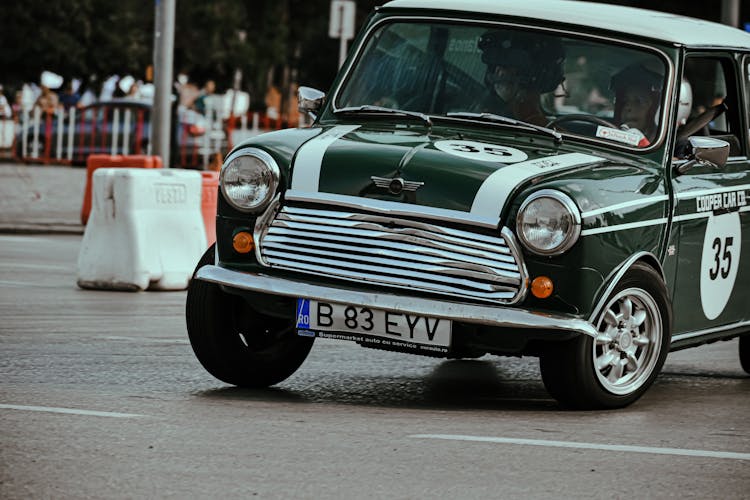 Vintage Car On Racetrack In City