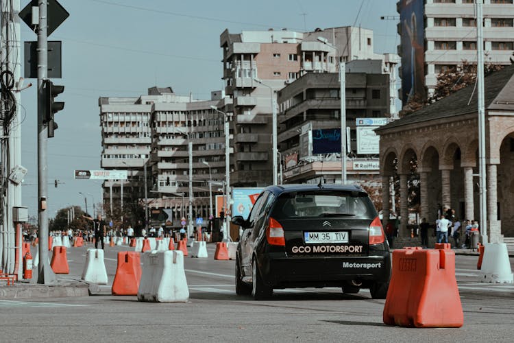 Car On Racetrack In City Center