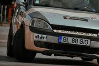 Modern small car during drifting on asphalt pavement while taking part in city rally race