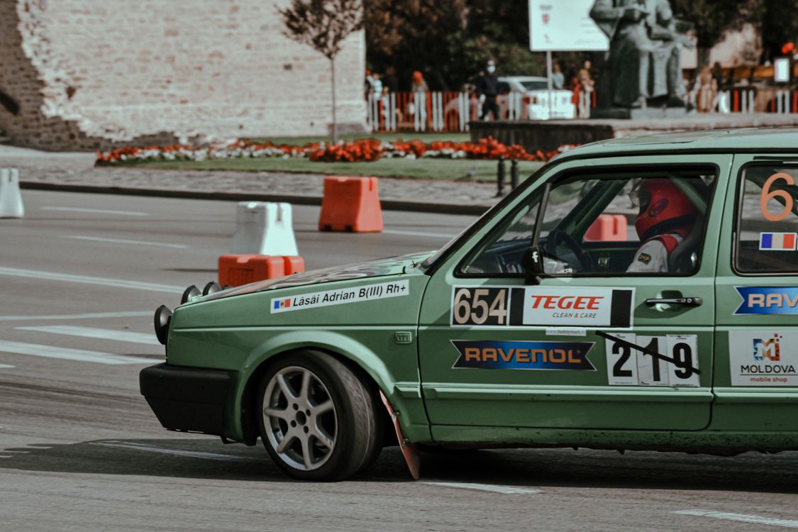 Man Riding on Racing Car · Free Stock Photo