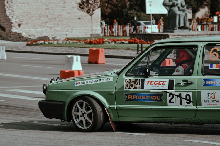 Old Car Racing In City Downtown