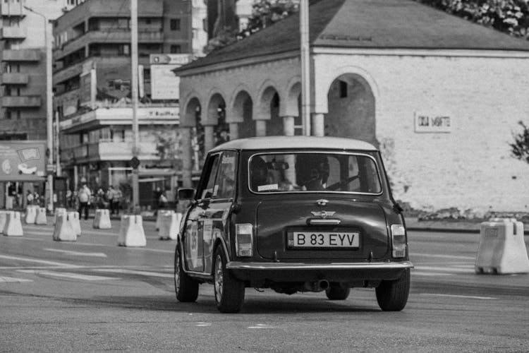 Retro Car Driving On Street