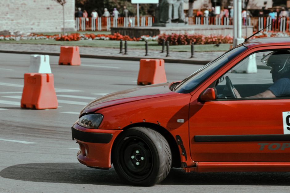 Car with Crit'Air sticker driving through a Low Emission Zone in a French city