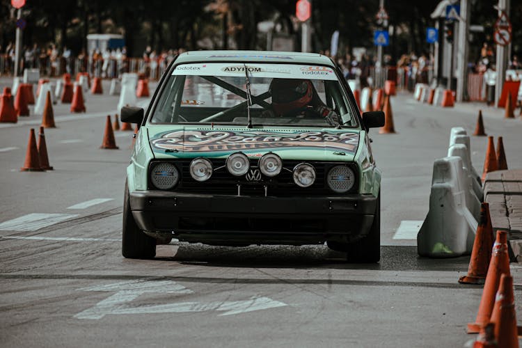 Retro Car On Road With Cones