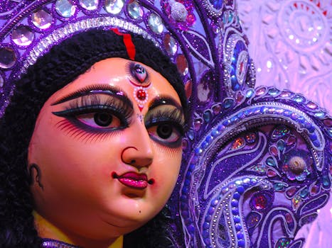 Vibrant close-up of a traditional Durga Puja sculpture showcasing intricate details and cultural artistry.