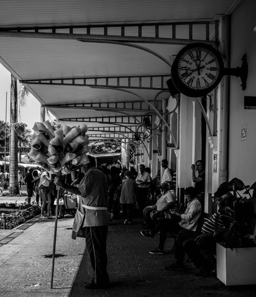 Free Black and white photo capturing people at Jaguariúna train station, Brazil. Stock Photo