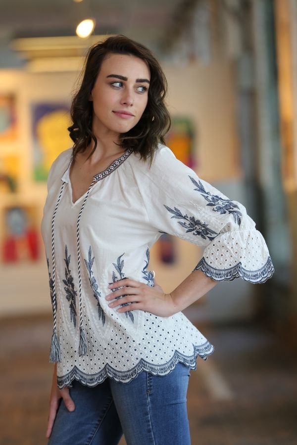 Embroidered peasant top with jeans