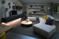 Cozy Living Room with Hanging Books on the Wall