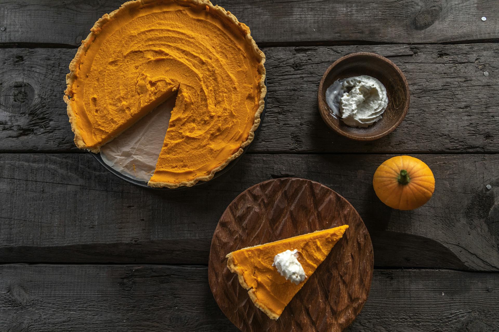 A Top Shot of a Pumpkin Pie on a Wooden Surface