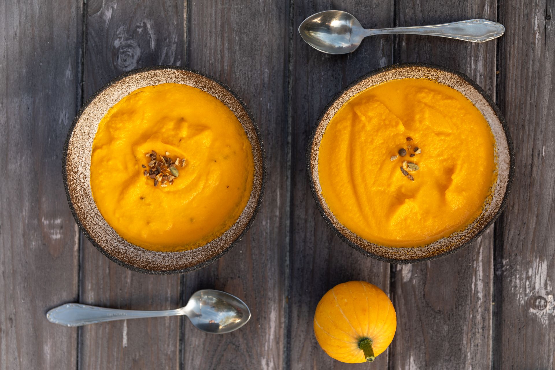A Close-Up Shot of Bowls of Pumpkin Soup