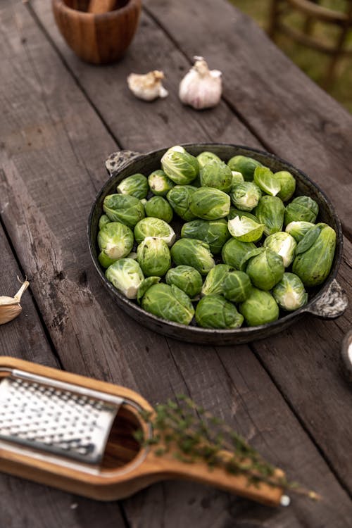 Free Photo Of Brussels Sprouts On Wooden Surface  Stock Photo