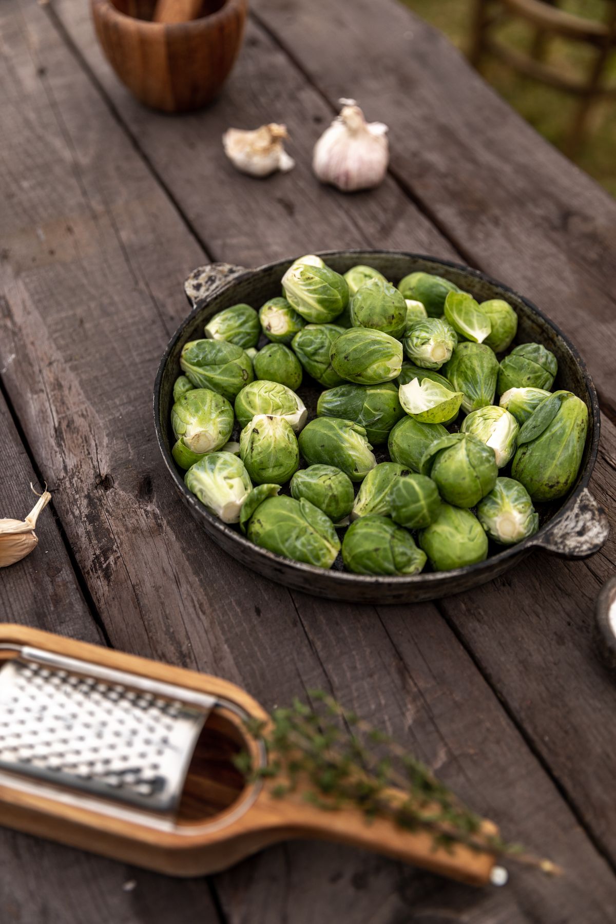 Fresh Brussels sprouts on a wooden surface