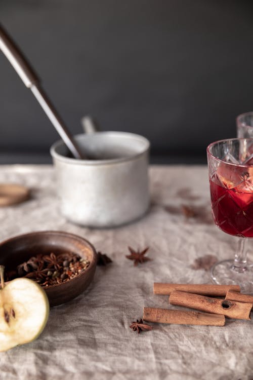 Free Glasses of Mulled Wine with Spices and Cinnamon Stock Photo