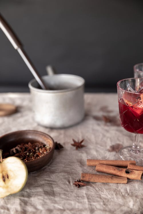 Glasses of Mulled Wine with Spices and Cinnamon