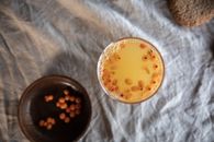Top View of Clear Drinking Glass With Yellow Liquid