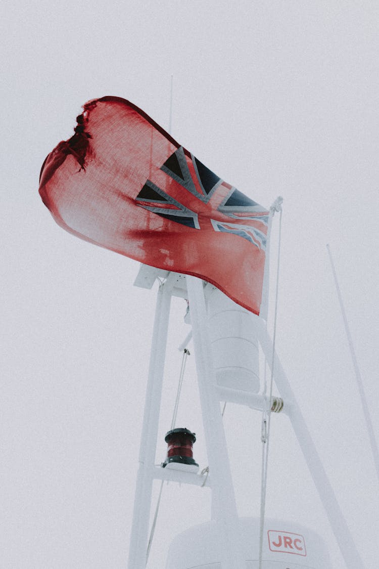 National United Kingdom Flag On Mast Of Yacht