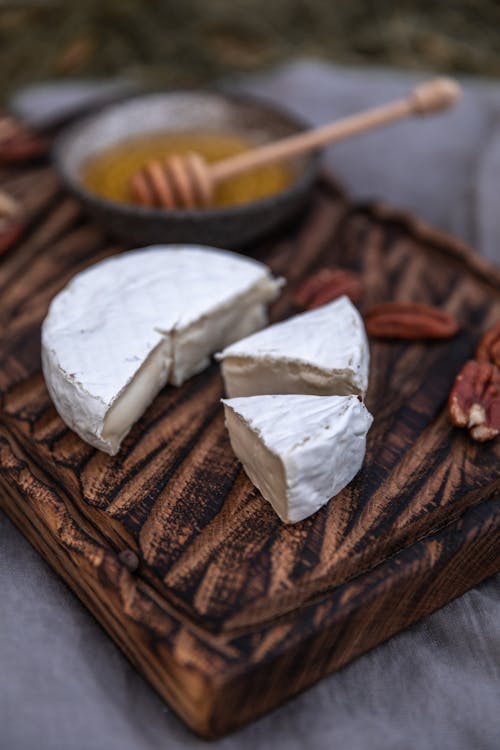 White Cheese over a Wooden Board