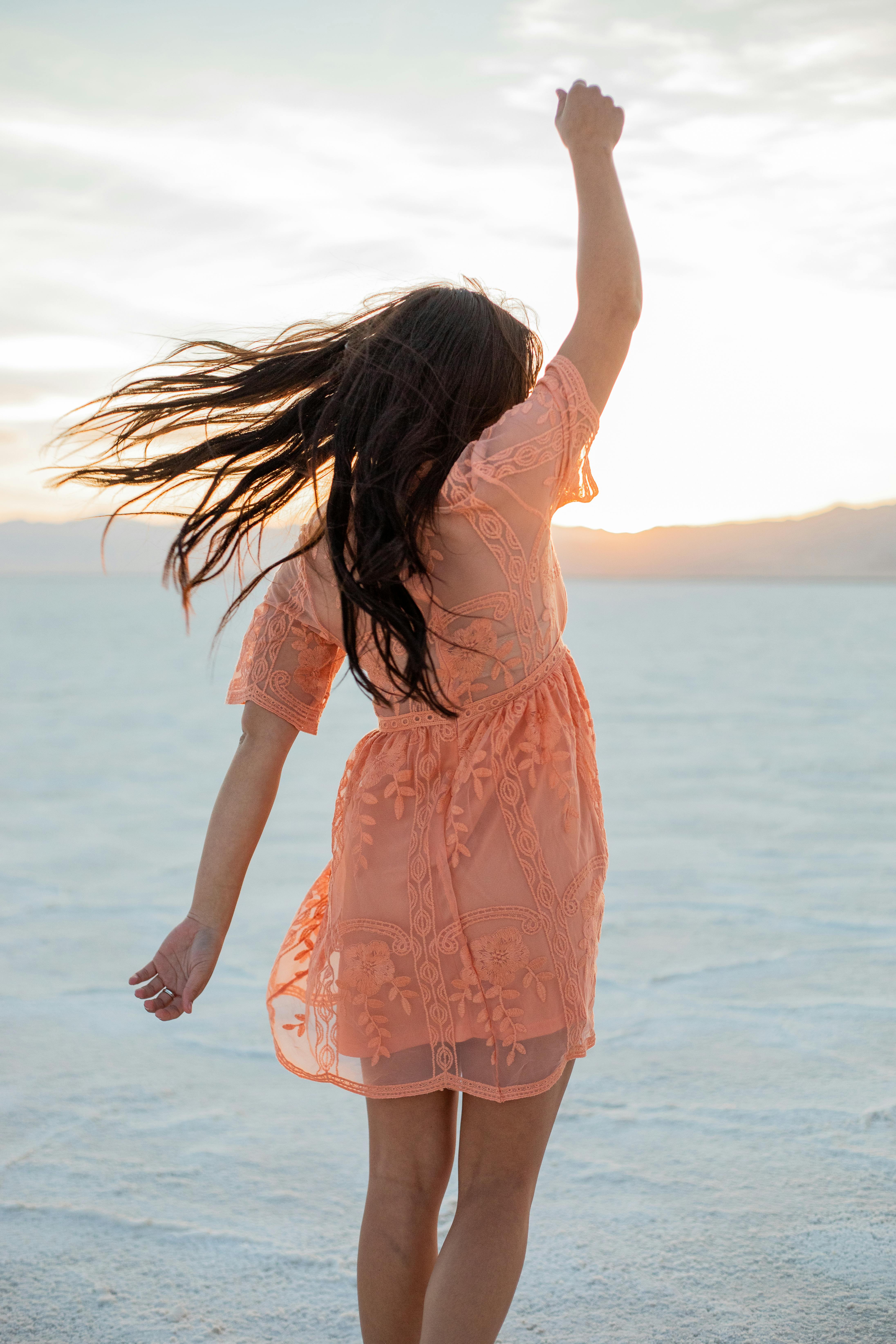 Woman in White and Green Dress Sitting on Swing during Sunset · Free Stock  Photo