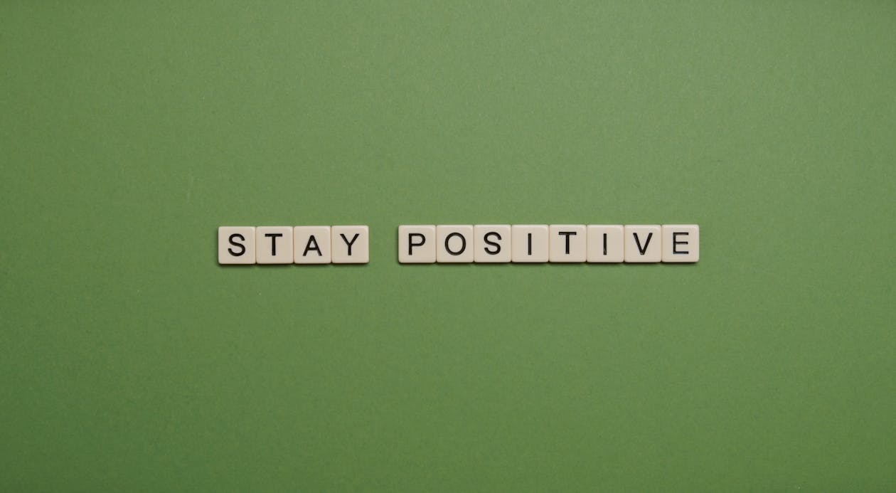 Stay Positive Text on Green Background