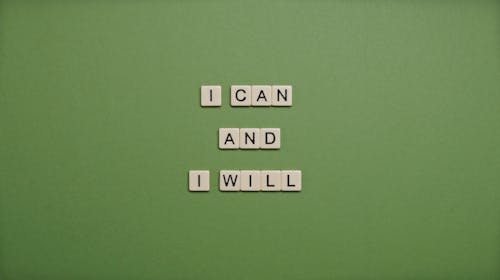 I Can and I Will Text On Green Background