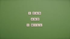 I Can and I Will Text On Green Background