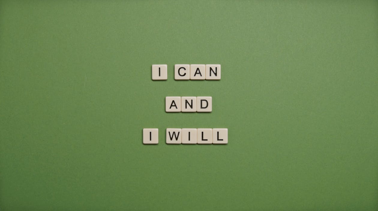 I Can and I Will Text On Green Background