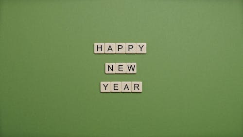 Happy New Year Text on Green Background