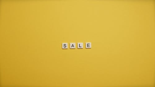  Sale Text On Yellow Background