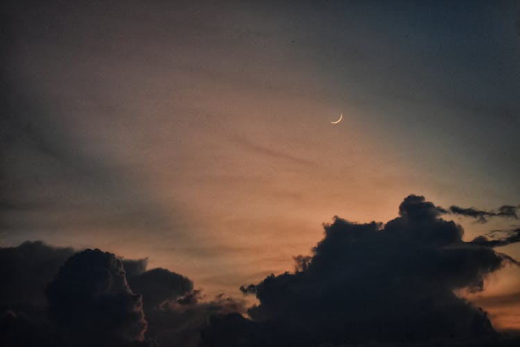 Crescent Moon On A Sunset Sky 