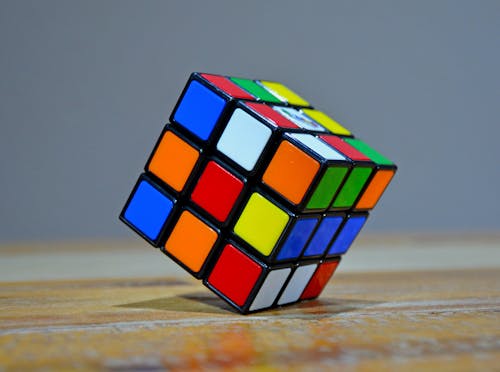 Free Rubik's Cube in Wooden Surface Stock Photo