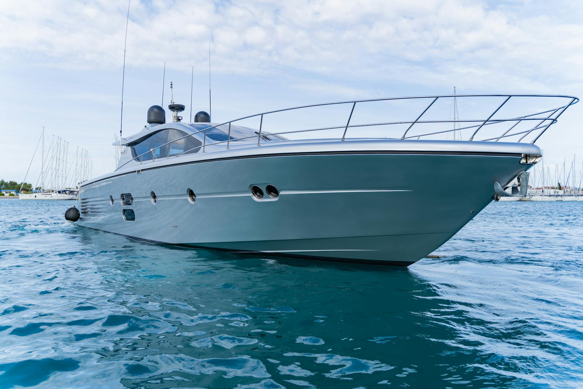 Explore a sleek luxury yacht docked in Croatia's pristine maritime environment.
