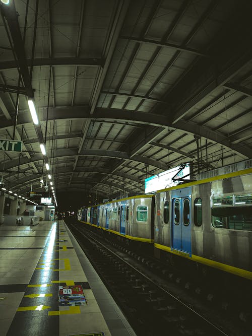 Railway station platform with modern train